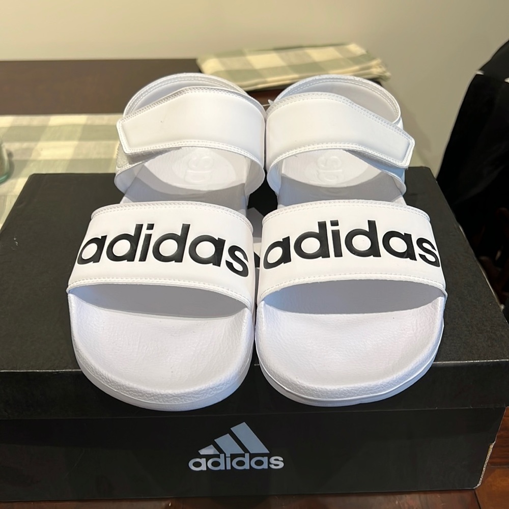 adidas Unisex Adilette Sandal Sneaker, White/Core Black, US M 9/US W 10